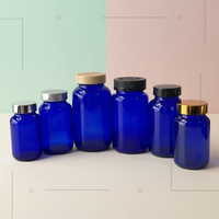 Flacon et pot en verre pharmaceutique bleu cobalt à large ouverture pour capsules et comprimés avec bouchon à filetage continu