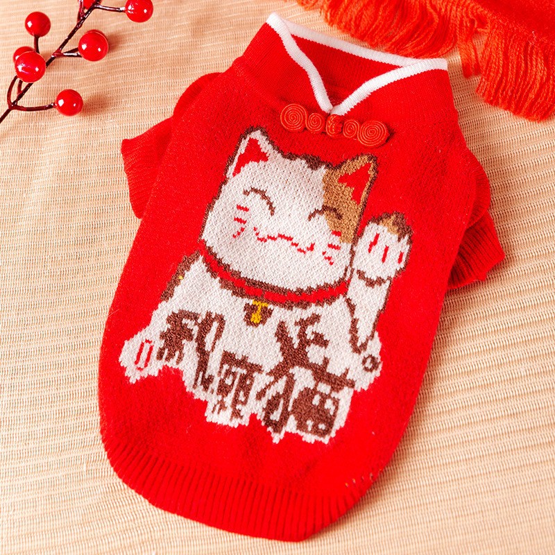 Chat porte-bonheur rouge