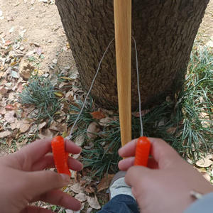 Scie à fil avec poignée en PP orange, outil de survie compact en acier inoxydable pour le camping et les situations d'urgence - Product Image 1