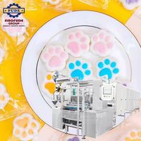 Ligne de production automatique de machines à extruder les guimauves, avec déposeur pour guimauves fourrées en forme de patte de chat