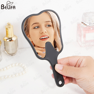 Nuovo Logo personalizzato Multi funzione a forma di dente cosmetico specchio portatile in plastica specchietti dentali con manico - Product Image 4