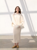 Pull en cachemire pour femme, col rond, manches ballon, tricot épais, coupe oversize, avec bordure en plumes, haut minimaliste de luxe pour l'hiver