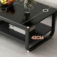 Table basse moderne à double niveau, plateau en bois imitant le marbre, structure en acier en forme de U, étagère de rangement pour salon