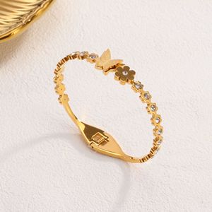 PVD 18K Gold Plated Titanium Stainless Steel Butterfly & Flower <b>Bangle</b> <b>Bracelet</b> with Spring Loaded Clasp for Women - Product Image 4