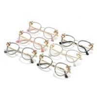 La plus récente vente en gros de lunettes de luxe en diamant anti-lumière bleue Oeil de chat fabrique des lunettes à lumière bleue pour hommes