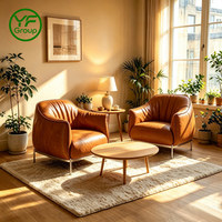 Fauteuil individuel moderne de luxe en cuir avec structure en acier inoxydable pour salle à manger et chambre à coucher