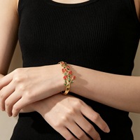Bracelet en acier inoxydable de style européen et américain, motif double fleur émaillée, plaqué or 18 carats sous vide, fermoir à pression, design original et frais