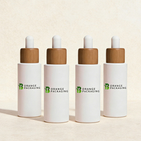 Flacon compte-gouttes en verre blanc mat avec bouchon en bambou naturel pour emballage de sérum, fournisseur de contenants cosmétiques personnalisés
