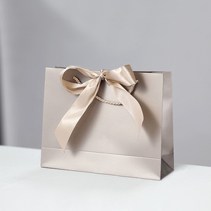 Các tông màu trắng Tote Túi tại chỗ bao bì Quà tặng Cung thương mại nước ngoài xách tay phân hủy Túi mua sắm có thể được in logo - Product Image 2