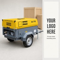 Compresseur d'air sur remorque Atlas Copco XA 77 E à essieu unique, avec capot à clapet et deux soupapes de sortie d'air en laiton