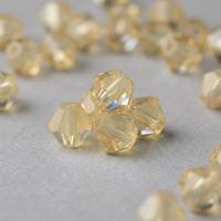 Perles à coudre en verre époxy bicône ultra transparentes de 4 mm, écologiques, durables et élégantes, pour la confection textile et la broderie.