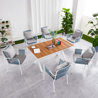 Table et chaise de balcon de jardin Chaise de canne d'extérieur Table et ensemble de trois pièces de loisirs