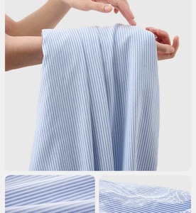 เสื้อเชิ้ตผู้ชายสไตล์บูติก แนวธุรกิจลำลอง ลายทางแนวตั้ง สีฟ้าอ่อน ทรงหลวม มีกระเป๋าเสื้อ พรีเมียม แขนยาว ติดกระดุม - Product Image 3