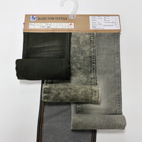 Tela vaquera de sarga teñida con hilo de algodón/poliéster/spandex de 9.4 oz, clásica de verano, de alta elasticidad para moda de jeans
