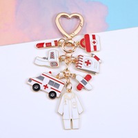 Porte-clés en émail sur le thème du personnel médical, en forme de cœur, ambulance, stéthoscope, uniforme de médecin, pendentif pour sac à main, cadeau pour infirmière, médecin
