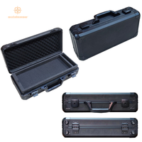 Boîte à outils en aluminium noir avec loquets sécurisés pour solution d'organisation de matériel électronique