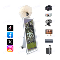 Cabine de photo à écran tactile portable de 32 pouces avec cadre de lumière LED RVB à haute luminosité pour les fêtes et les événements de mariage