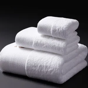 Vente directe d'usine Logo <span class=keywords><strong>brodé</strong></span> Ensemble <span class=keywords><strong>de</strong></span> serviettes <span class=keywords><strong>de</strong></span> visage en coton blanc Serviettes <span class=keywords><strong>de</strong></span> <span class=keywords><strong>bain</strong></span> pour hôtel - Product Image 1