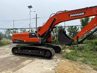 Excavatrice d'occasion 25 tonnes Doosan DX225LC-9C avec cabine et godet