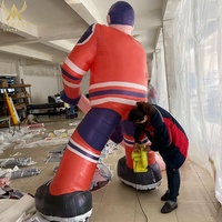Jugador inflable de hockey sobre hielo, puckster inflable gigante, deporte inflable de dibujos animados z05