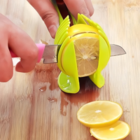 Pince anti-brûlure circulaire et trancheuse de fruits et légumes en plastique pince à couper le citron pour tomates citrons oeufs Fruits