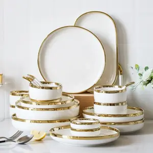 Set da pranzo in ceramica bianca di lusso in oro ciotole per insalata Ramen piatti e piatti per la cena con set regalo cucchiaio per la cucina