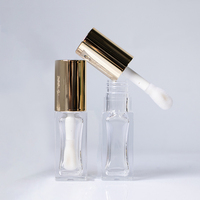 Bouteille ronde dorée transparente, vente en gros d'usine, tubes de brillant à lèvres en plastique vides de 5,5 ml avec logo personnalisé, autres emballages en plastique