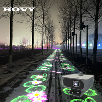 Projection LED interactive multicolore pour sol, portable et légère, idéale pour les événements en plein air et les aires de jeux pour enfants.