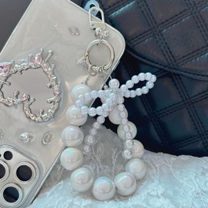 Breloques de téléphone pour filles tendance, avec perles, nœuds et perles de culture, utilisables comme porte-clés, chaîne de téléphone, dragonne ou bracelet. - Product Image 4