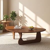 Table basse en bois massif de design japonais avec plateau en forme d'alien pour salon et balcon au style minimaliste moderne