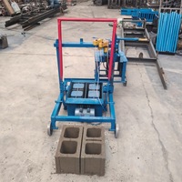Machine de moulage multifonctionnelle la plus vendue pour briques creuses, briques pleines et briques de pavage en Afrique