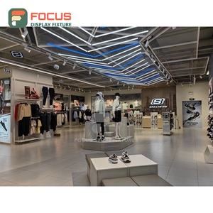 Comptoir d'exposition sur mesure en matériaux variés pour magasin de vêtements – Solution d'aménagement de boutique - Product Image 1