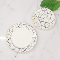 Service de vaisselle en céramique de style nordique luxueux avec motif craquelé en marbre noir et bord doré, parfait pour hôtel, restaurant, mariage
