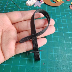Stylish and minimalist PU leather lanyard keychain, belt <b>bag</b> <b>charm</b>, niche PU leather rope doll accessory. - Product Image 5