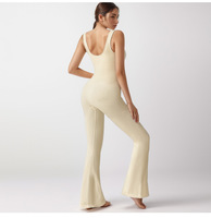 Nouvelle combinaison de sport Yimo pour femme, couleur unie, côtelée, épaisse, avec pantalon évasé de yoga, haut tube intégré, moulante, pour la gym