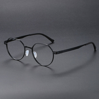 Nouvelles Lunettes Optiques Rondes en Titane pour Myopie 80992 – Montures de Lunettes de Vue Unisexe pour Professionnels