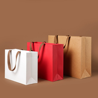 Sac à main en carton ondulé biodégradable haut de gamme personnalisable pour le commerce extérieur, impression de logo pour la promotion de vêtements et de cadeaux, vente en gros