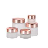 Emballage cosmétique vide OEM en verre givré transparent mat avec couvercle rose doré pour crème pour le visage