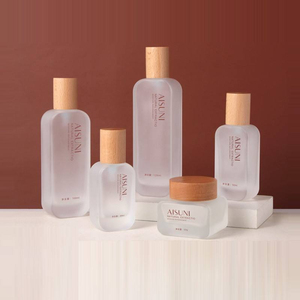 Produits de soin de la peau en stock, pompes distributeurs, lotions, sérums, nouveau style, bouchons en bois massif, flacons en verre de 50 g - Product Image 1