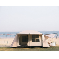 Tente de camping multi-personnes quatre saisons à double couche avec deux chambres et un salon, design pliable et imperméable en tissu Oxford