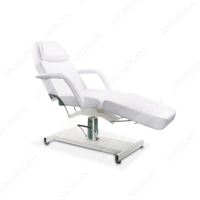 Table de massage pliable moderne en cuir véritable réglable avec caractéristiques thérapeutiques pour salon et usage domestique, éponge haute densité