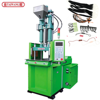 Machine de moulage par injection à table coulissante verticale hydraulique contrôlée par PLC TAIWANG pour la fabrication de fermetures éclair en PP/PVC/PA/PE/PC