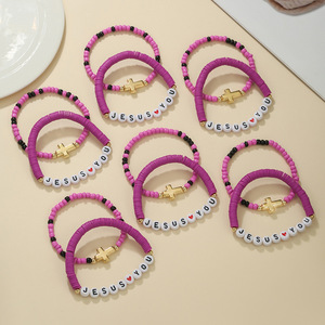 Meilleures ventes Bracelet tendance en céramique souple coloré avec lettres et croix plaqué or unisexe - Product Image 3