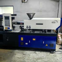 Machine de moulage par injection servo Hai Tian 120 tonnes d'occasion à vendre, 90% neuve, PP PE ABS PC PA HDPE PET pour petits produits