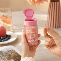 Bouteille de complément alimentaire en verre givré rose de 150 ml avec bouchon à clapet rose, personnalisable avec logo