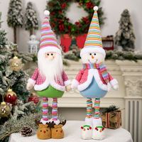 Entzückende Bunte Weihnachtsdekoration Ausziehbare Gnome & Einziehbare Schneemann-Puppen mit Gestreiften Beinen Weihnachtsmann-Figuren