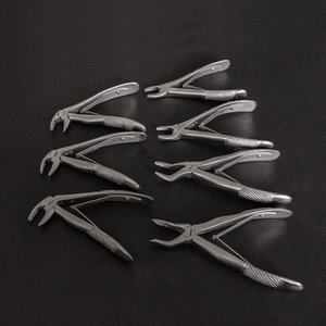 Pinzas de Extracción Dental Pediátricas, Instrumentos Quirúrgicos Dentales, Pinzas de Extracción de Dientes del Saburdo de la Mandíbula Superior e Inferior - Product Image 1
