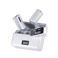 Nouveau Micro Cravate Sans Fil 2.4G 2-en-1 2025 avec Boîtier de Charge, Plug and Play, Réduction du Bruit pour iPhone Android et Streaming