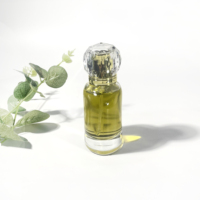 Bouteille de parfum de luxe transparente de 50ml en verre de forme unique avec emballage d'épices de pulvérisation de brouillard vente de bouteilles de parfum vides