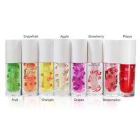 Vente en gros de logo personnalisé brillant à lèvres végan maquillage liquide minéral aromatisé aux fruits longue durée en boîte d'huile transparente emballage de marque privée